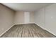 Bedroom featuring wood floors and white door at 908 Kennesaw Dr, Forest Park, GA 30297