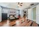 Stylish bedroom with vaulted ceiling, hardwood floors, and comfortable lounge seating at 2331 Flowerdale Ct, Douglasville, GA 30135
