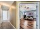 Bonus room with hard wood floors and comfortable lounging area with two reclining chairs at 2331 Flowerdale Ct, Douglasville, GA 30135