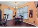Charming breakfast nook features a modern chandelier and a window that provides natural light at 2331 Flowerdale Ct, Douglasville, GA 30135