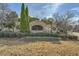 Stone structure with the neighborhood name, Chestnut Hills, trimmed with shrubbery and wreaths at 2331 Flowerdale Ct, Douglasville, GA 30135