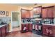 Efficient kitchen with ample cabinet space, backsplash, and modern appliances at 2331 Flowerdale Ct, Douglasville, GA 30135