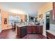 Well-lit kitchen featuring modern appliances and a view into the dining room at 2331 Flowerdale Ct, Douglasville, GA 30135