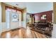 Inviting living room with hardwood floors and a view of the front entry at 2331 Flowerdale Ct, Douglasville, GA 30135