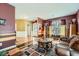 Open living room with hardwood floors and a glimpse of the front entry at 2331 Flowerdale Ct, Douglasville, GA 30135