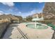 Pool and recreation area featuring two pools, a building, and fence around the pool at 2331 Flowerdale Ct, Douglasville, GA 30135