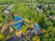 Community amenities featuring tennis courts, a swimming pool, and recreational area for residents to enjoy at 2604 Heltonwood Ct, Buford, GA 30519