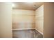 Walk-in closet with custom wire shelving and neutral carpeting at 2604 Heltonwood Ct, Buford, GA 30519