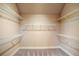 Spacious walk-in closet with custom wire shelving, ideal for organization at 2604 Heltonwood Ct, Buford, GA 30519
