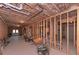 Unfinished basement with exposed ceiling, framing, and concrete floors offers customization opportunities at 295 Hanover Dr, Villa Rica, GA 30180