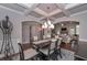 Open-concept dining area seamlessly connects to the living space, offering a bright and inviting atmosphere with hardwood floors at 295 Hanover Dr, Villa Rica, GA 30180