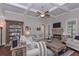Cozy living room features a coffered ceiling, stone fireplace, and stylish decor, creating a welcoming and comfortable space at 295 Hanover Dr, Villa Rica, GA 30180