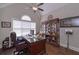 Bright office with built in shelving, a ceiling fan, and large windows at 295 Hanover Dr, Villa Rica, GA 30180