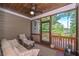 Inviting screened porch offers comfortable seating and views of the surrounding greenery at 295 Hanover Dr, Villa Rica, GA 30180