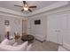 Sitting room with ample seating, carpet floors and a ceiling fan at 295 Hanover Dr, Villa Rica, GA 30180