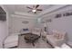 Sitting room with ample seating and a ceiling fan at 295 Hanover Dr, Villa Rica, GA 30180