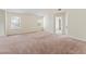 Large bedroom featuring vaulted ceilings and three windows for natural lighting at 507 Vaughan Dr, Hampton, GA 30228