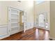 Bright foyer with hardwood floors, high ceilings, and modern doors at 507 Vaughan Dr, Hampton, GA 30228