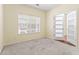 Room with carpet, natural light and modern paneled doors at 507 Vaughan Dr, Hampton, GA 30228