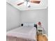 A cozy bedroom with a comfortable queen-sized bed and a vintage nightstand at 1274 Cotton Gin Dr, Powder Springs, GA 30127
