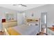 Bright bedroom with a neutral color palette, dresser, and a decorative mirror at 1274 Cotton Gin Dr, Powder Springs, GA 30127