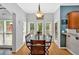 Charming breakfast nook with natural light, view of the deck, and bar access to the kitchen at 1274 Cotton Gin Dr, Powder Springs, GA 30127