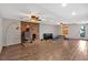 Finished basement area with brick accents, a drop ceiling and wood style flooring at 179 Hogan Rd, Brooks, GA 30205