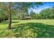 Expansive lot with mature trees and lush green grass, offering privacy and natural beauty at 179 Hogan Rd, Brooks, GA 30205