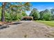 A spacious carport with a concrete driveway at 179 Hogan Rd, Brooks, GA 30205