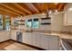 Updated kitchen featuring granite countertops, stainless steel appliances, and wooden ceiling at 179 Hogan Rd, Brooks, GA 30205