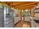 Updated kitchen featuring granite countertops, stainless steel appliances, and wooden ceiling at 179 Hogan Rd, Brooks, GA 30205