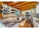 Updated kitchen featuring granite countertops, stainless steel appliances, and wooden ceiling at 179 Hogan Rd, Brooks, GA 30205