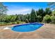 Inviting outdoor pool with fountain feature, perfect for relaxation and recreation at 179 Hogan Rd, Brooks, GA 30205