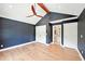 This bedroom has hardwood floors, neutral paint, closet, and access to the bathroom at 1815 Coventry Rd, Decatur, GA 30030