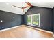 This bedroom features an elegant ceiling fan, hardwood floors, and a window with natural light at 1815 Coventry Rd, Decatur, GA 30030