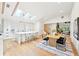 Bright open-concept kitchen and dining area with skylights and modern decor at 1815 Coventry Rd, Decatur, GA 30030