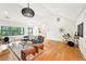 Inviting living room with hardwood floors, vaulted ceilings, and a cozy seating area at 1815 Coventry Rd, Decatur, GA 30030