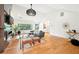 Stylish living room with hardwood floors, modern fireplace, and large bright windows at 1815 Coventry Rd, Decatur, GA 30030