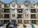 Townhome featuring garage parking, a balcony, and neutral siding at 2728 Wander Ln, Alpharetta, GA 30022