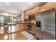 Well-appointed kitchen featuring stainless steel appliances, granite countertops, and ample cabinet space at 2728 Wander Ln, Alpharetta, GA 30022