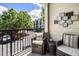 Cozy patio area with outdoor seating and view of the community at 2728 Wander Ln, Alpharetta, GA 30022