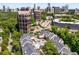 Aerial view of Habersham of Buckhead, highlighting the community pool and proximity to city buildings at 3655 Habersham Ne Rd # 203, Atlanta, GA 30305
