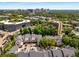 Aerial view of community showing the building's layout and surrounding trees at 3655 Habersham Ne Rd # 203, Atlanta, GA 30305