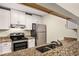 Updated kitchen featuring stainless steel appliances, granite countertops, and ample cabinet space at 3655 Habersham Ne Rd # 203, Atlanta, GA 30305