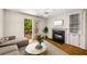 Inviting living room featuring a fireplace, built-in shelves, and access to the outdoor balcony at 3655 Habersham Ne Rd # 203, Atlanta, GA 30305