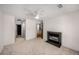 Bright and spacious living room with fireplace and neutral carpeting at 3655 Habersham Ne Rd # 203, Atlanta, GA 30305