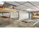 Interior view of reserved parking spots and storage area in a well-lit parking garage at 3655 Habersham Ne Rd # 203, Atlanta, GA 30305
