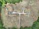 Overhead view showcases buildings and expansive land with treed perimeter at 615 Henderson Mill Rd, Covington, GA 30014