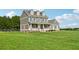Expansive property features a large home, outbuilding, and a fenced yard at 615 Henderson Mill Rd, Covington, GA 30014