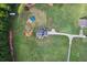 Aerial view showcasing a home with a large yard and above ground pool at 615 Henderson Mill Rd, Covington, GA 30014